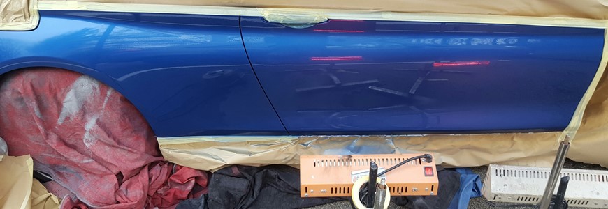 Blue bmw lease car scratch + dent repair